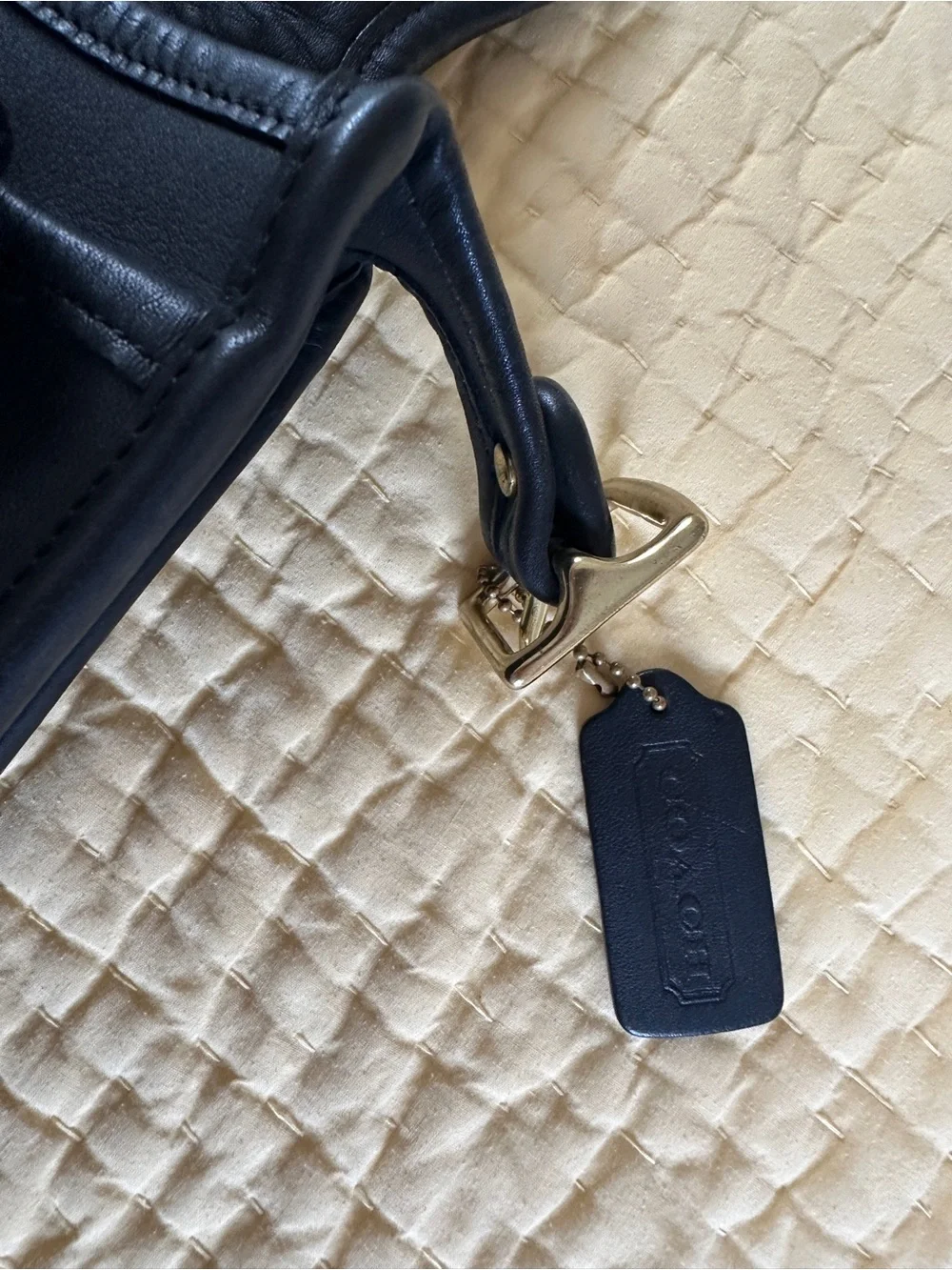 Coach sleek black